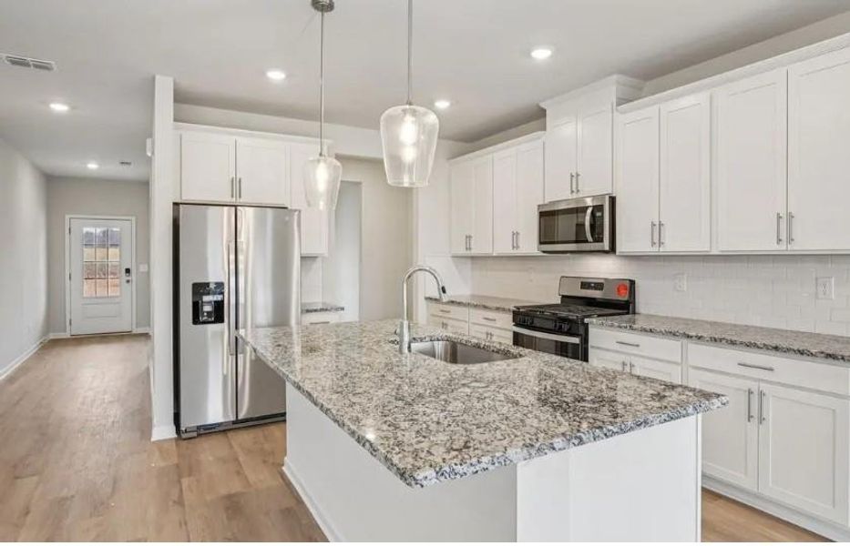 Furnished interior view inside a new home in Harmony Manor, Fairburn (Image 6).