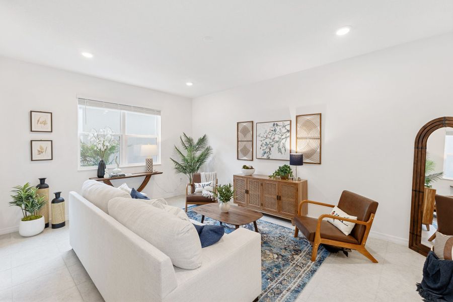 Representative furnished interior of a home built from the Jackson by Park Square Residential in The Residences at Emerson Park, Apopka (Image 9).