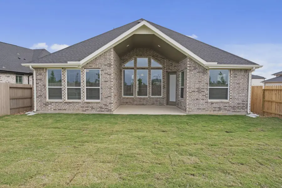 Exterior details and patio area of a home in Grange, Katy (Image 3).