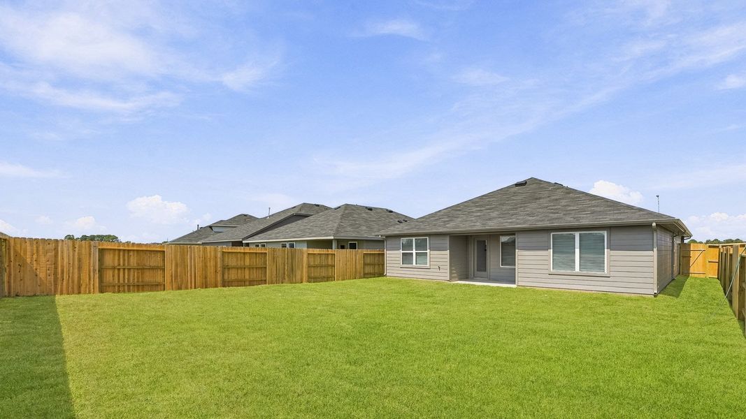 Exterior details and patio area of a home in Newport Pointe, Crosby (Image 3).