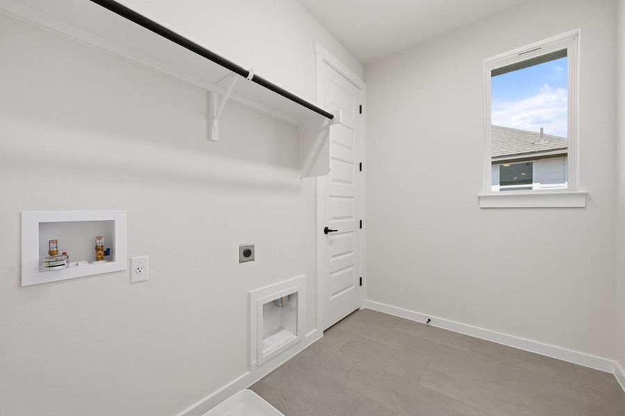 Spacious, unfurnished interior of a new home in Terrace Collection At Turner's Crossing, Buda (Image 25).