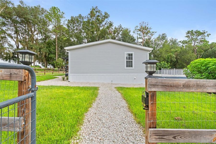Exterior details and patio area of a home in , Brooksville (Image 25).