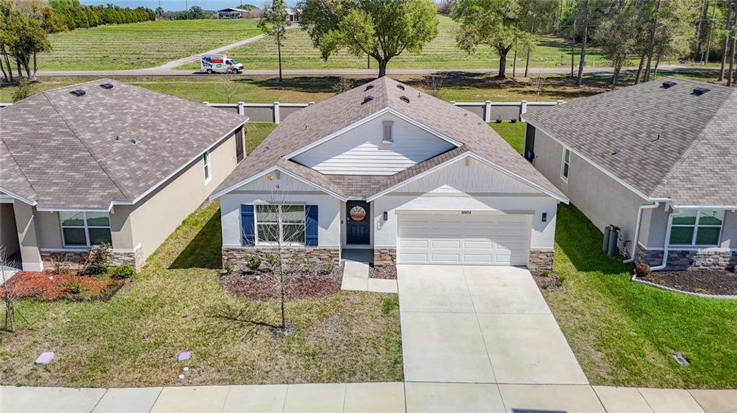 Front exterior of a new home in , San Antonio, FL, highlighting curb appeal (Image 24).