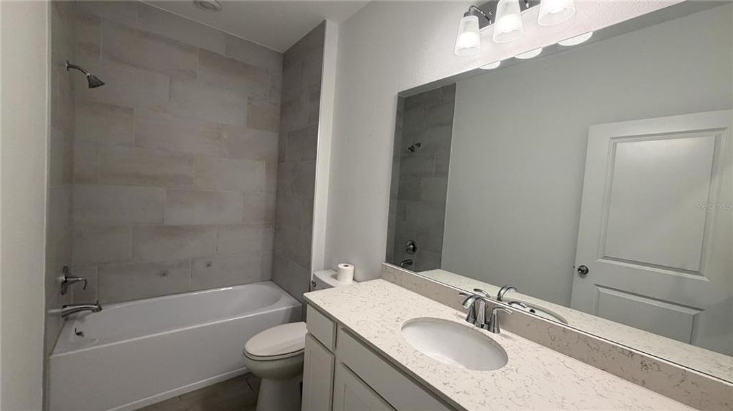 Furnished interior view inside a new home in Grand Park North, Dunnellon (Image 5).