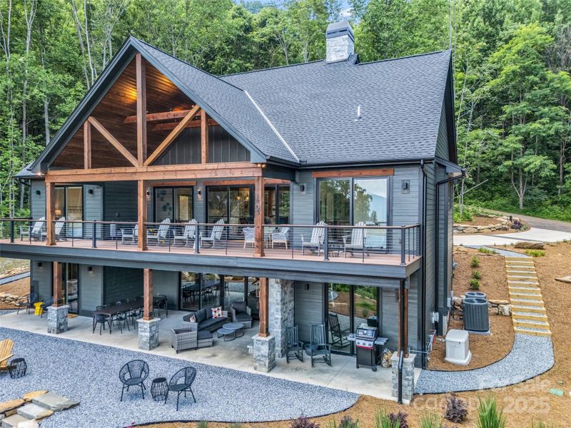 Front exterior of a new home in , Mill Spring, NC, highlighting curb appeal (Image 18).