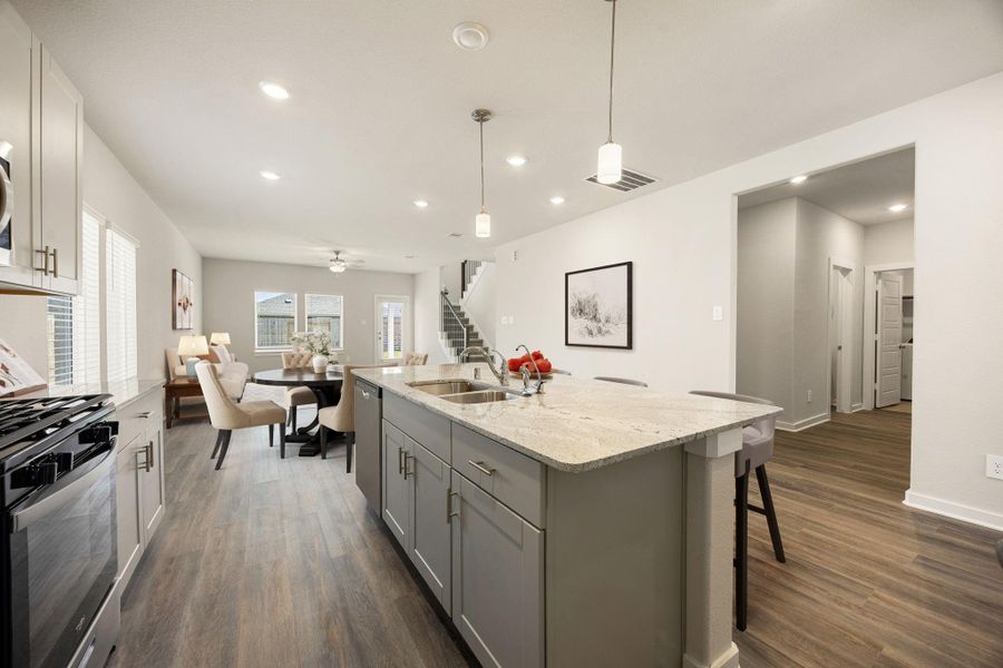 Just look at this amazing and immaculate kitchen! This kitchen conveniently connects to the dining room and living room for easy entertaining. *Virtually Staged Just look at this amazing and immaculate kitchen! This kitchen conveniently connects to the dining room and living room for easy entertaining. *Virtually Staged