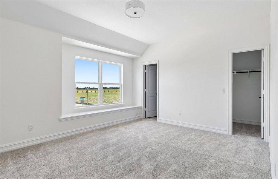 Spacious secondary bedroom with large window