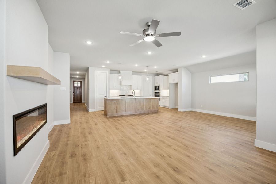 Representative unfurnished interior of a home built from the Adolphus by Centre Living Homes in Painted Tree Woodland West, McKinney (Image 13).