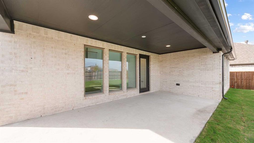Exterior details and patio area of a home in Devonshire - Reserve 50', Forney (Image 3). Exterior details and patio area of a home in Devonshire - Reserve 50', Forney (Image 3).