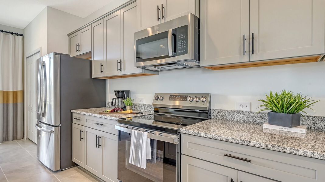 Representative furnished interior of a home built from the Morgan by Neal Communities in Grand Park, Sarasota (Image 15).