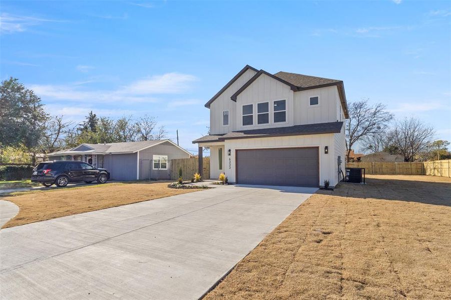 Front exterior of a new home in , Dallas, TX, highlighting curb appeal (Image 24).