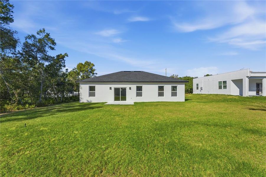 Exterior details and patio area of a home in , Ocala (Image 24).