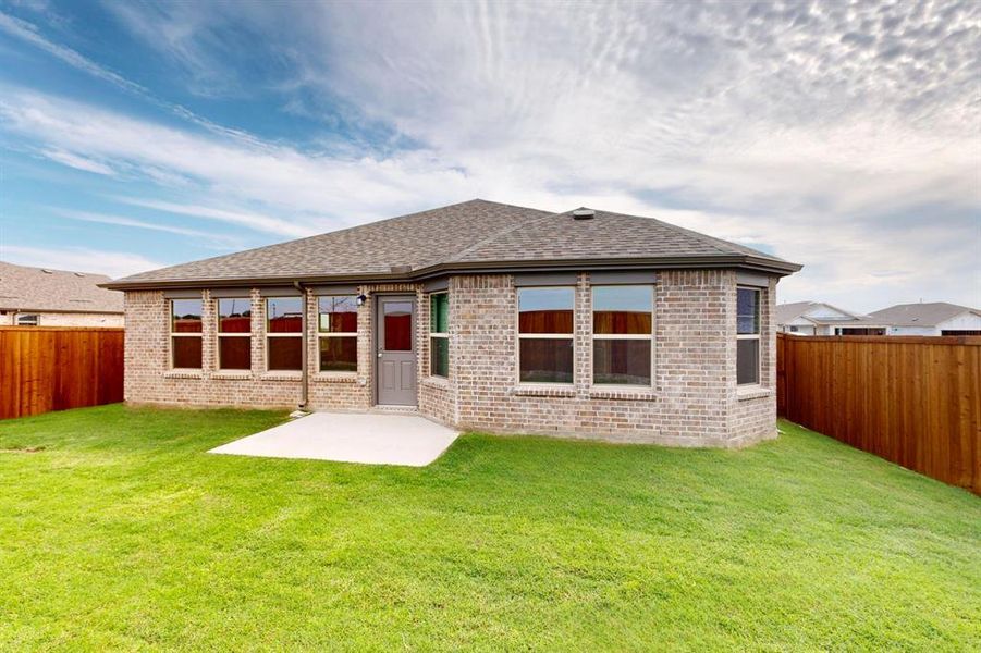 Exterior details and patio area of a home in Mobberly Farms, Pilot Point (Image 3). Exterior details and patio area of a home in Mobberly Farms, Pilot Point (Image 3).