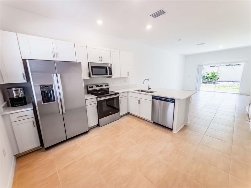 Furnished interior view inside a new home in , Sarasota (Image 7).