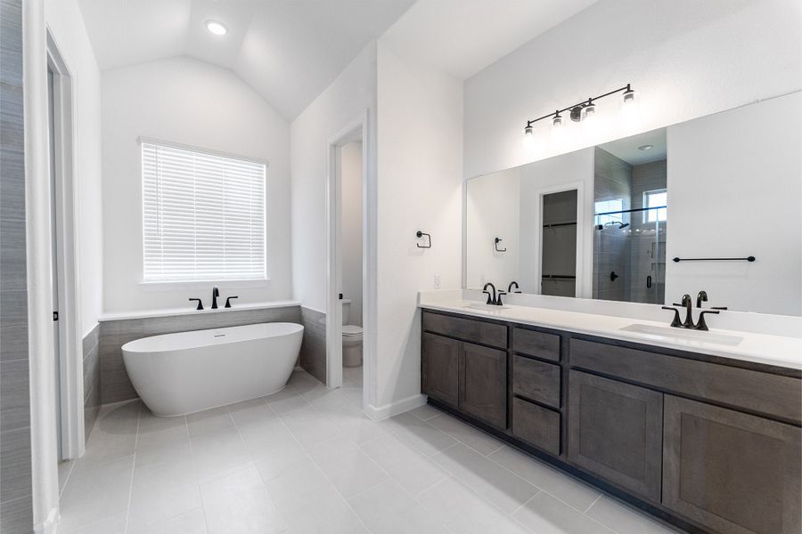 Furnished interior view inside a new home in Green Meadows, Celina (Image 8).