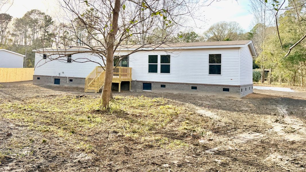 Exterior details and patio area of a home in , Bonneau (Image 22).