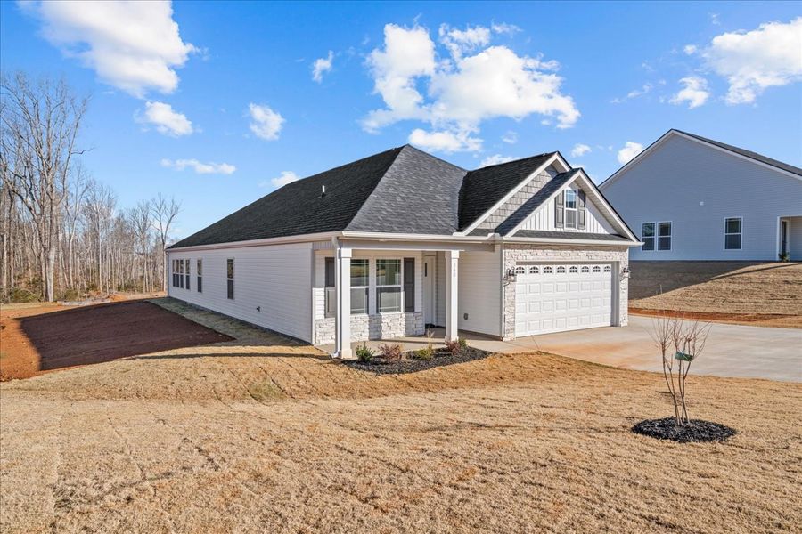 Representative exterior details of a home built from the Cheshire by Enchanted Homes in Hampshire Heights, Moore (Image 22).