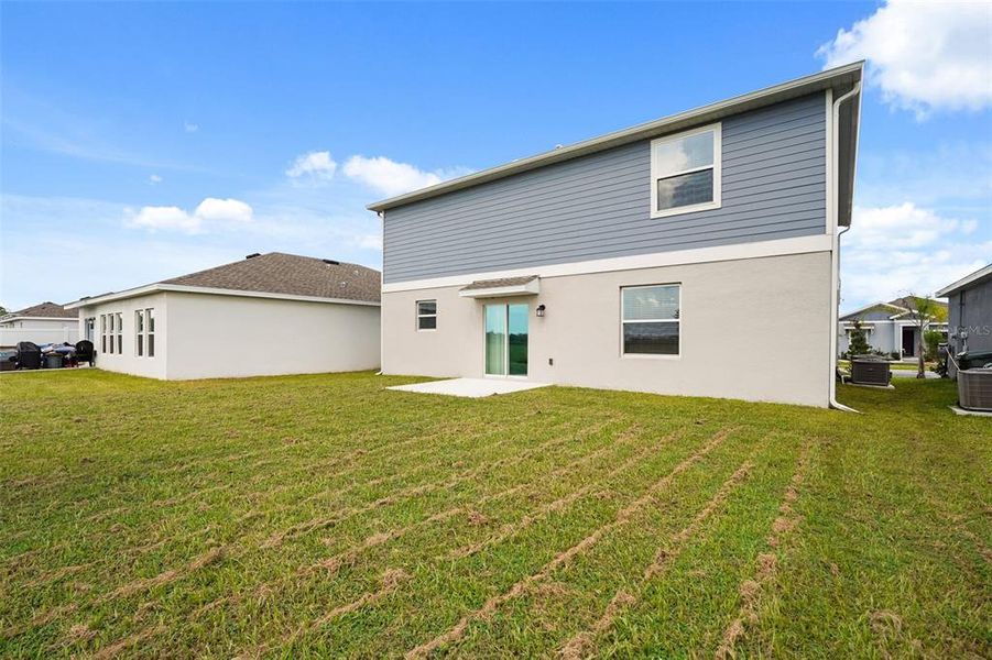 Exterior details and patio area of a home in Knightsbridge, Kissimmee (Image 2). Exterior details and patio area of a home in Knightsbridge, Kissimmee (Image 2).