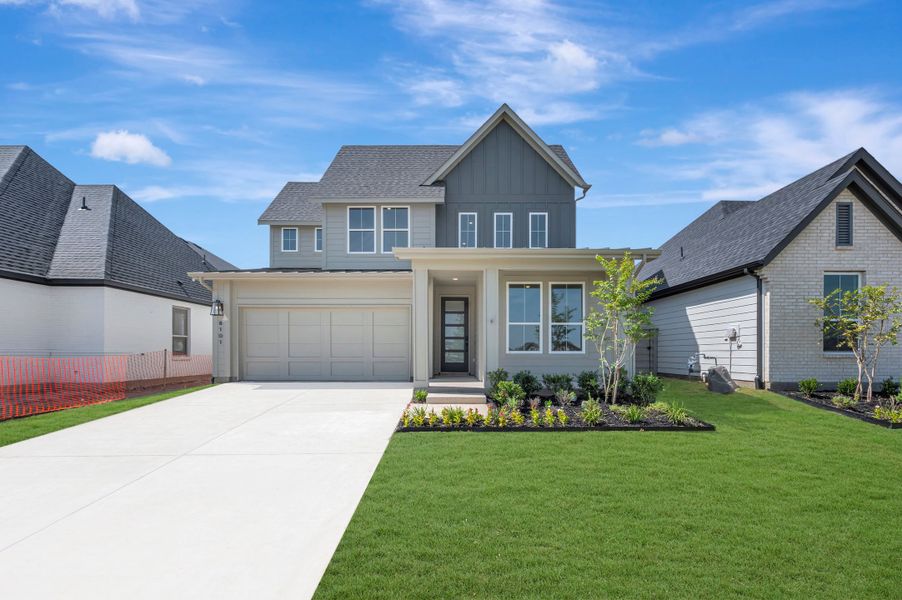 Front exterior of a new home in Landmark, Argyle, TX, highlighting curb appeal (Image 1). Front exterior of a new home in Landmark, Argyle, TX, highlighting curb appeal (Image 1).