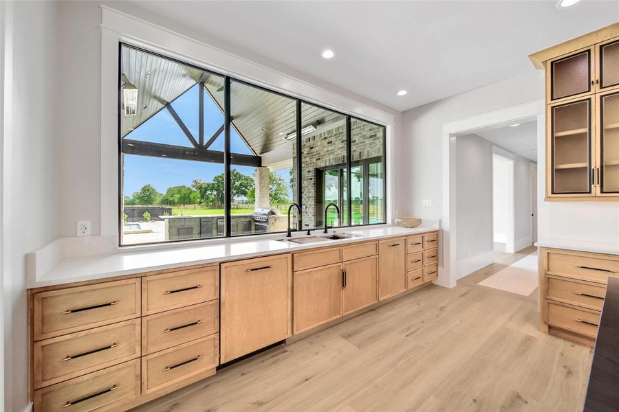 Prep your gourmet meal while looking out the large picture windows over the covered patio. Cabinetry is custom fitted to cover the dishwasher and refrigerator Large drawers are great for storing plenty of kitchen essentials. Double Over with removeable rotisserie feature and self-cleaning convection oven. Prep your gourmet meal while looking out the large picture windows over the covered patio. Cabinetry is custom fitted to cover the dishwasher and refrigerator Large drawers are great for storing plenty of kitchen essentials. Double Over with removeable rotisserie feature and self-cleaning convection oven.