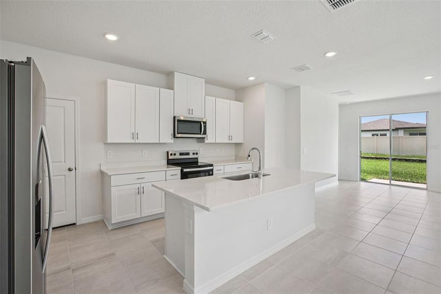 Furnished interior view inside a new home in Two Rivers - Premier Series, Zephyrhills (Image 6).