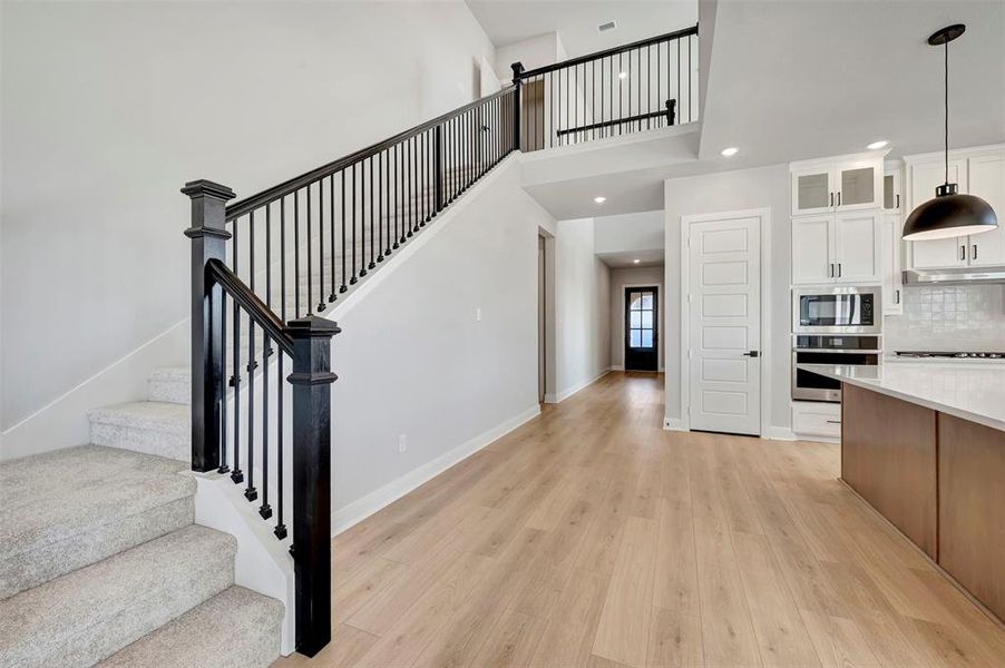 Furnished interior view inside a new home in Pecan Square - Gardens, Northlake (Image 7).