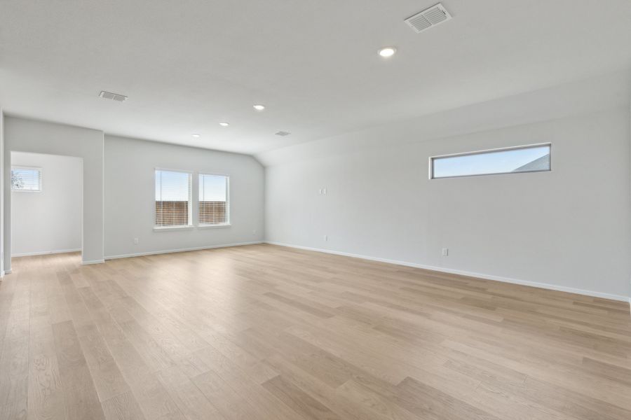 Living Room in the Hayden home plan by Trophy Signature Homes – REPRESENTATIVE PHOTO