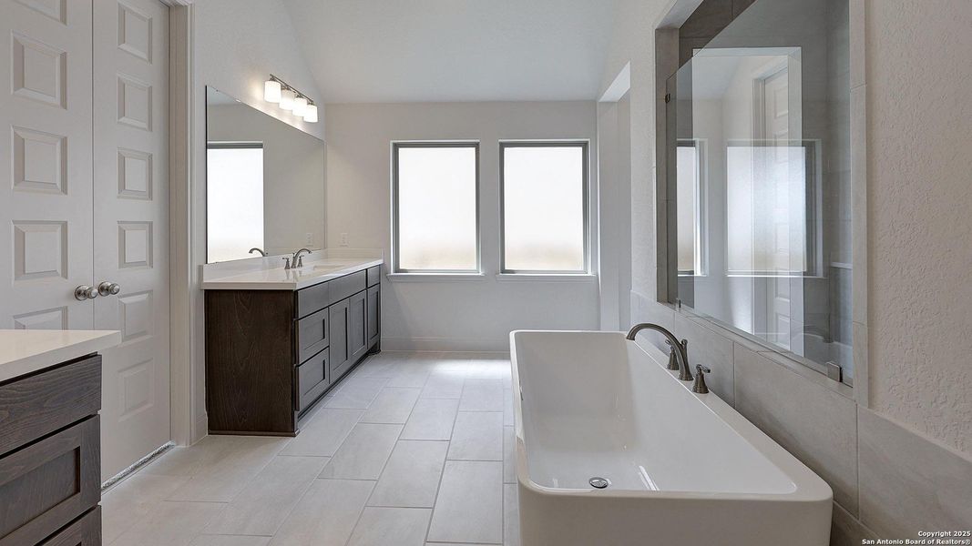 Furnished interior view inside a new home in Kallison Ranch 60', San Antonio (Image 9).