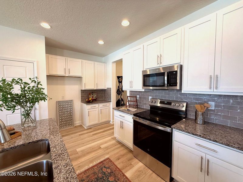Furnished interior view inside a new home in , Jacksonville (Image 12).