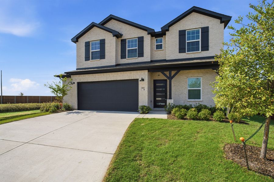 Front exterior of a new home in Heartland, Heartland, TX, highlighting curb appeal (Image 2). Front exterior of a new home in Heartland, Heartland, TX, highlighting curb appeal (Image 2).