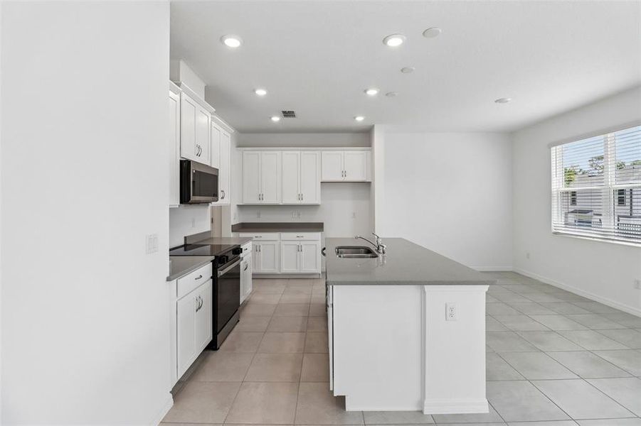 Furnished interior view inside a new home in Beresford Woods, Deland (Image 6).