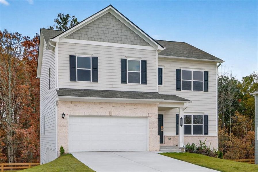 Front exterior of a new home in Roxeywood Park, Winder, GA, highlighting curb appeal (Image 2). Front exterior of a new home in Roxeywood Park, Winder, GA, highlighting curb appeal (Image 2).