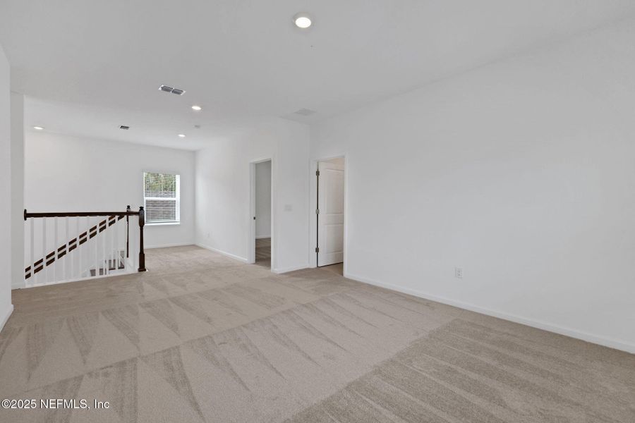 Spacious, unfurnished interior of a new home in TrailMark, St. Augustine (Image 42).