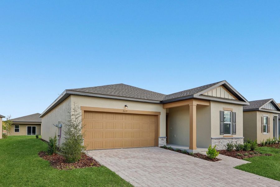 Representative exterior photo of a completed home built from the Moonbeam by Starlight Homes in Hawks Run, Kissimmee, FL (Image 2).