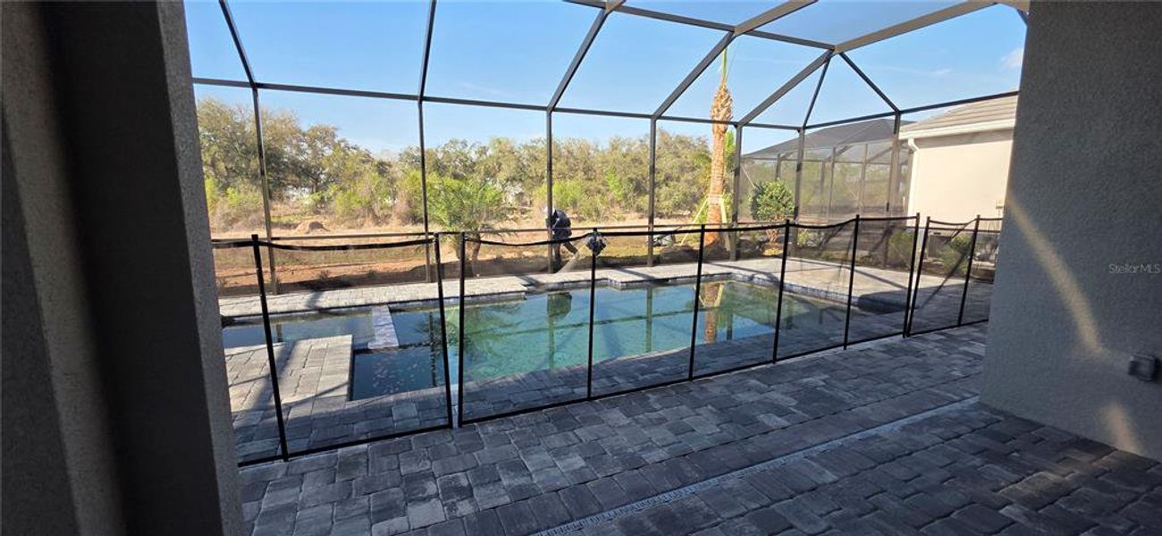 Exterior details and patio area of a home in Calusa Country Club, Lakewood Ranch (Image 14).