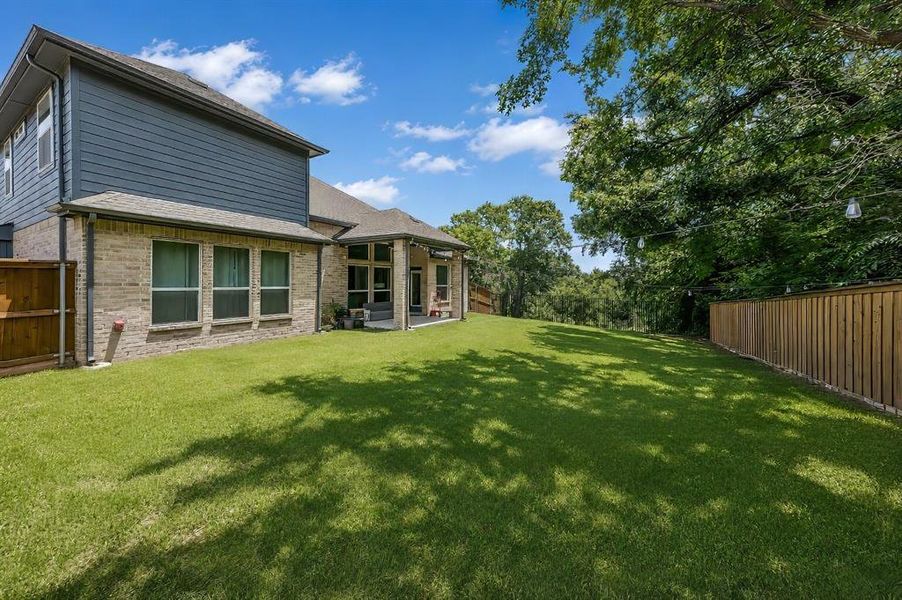 Exterior details and patio area of a home in , Little Elm (Image 27).