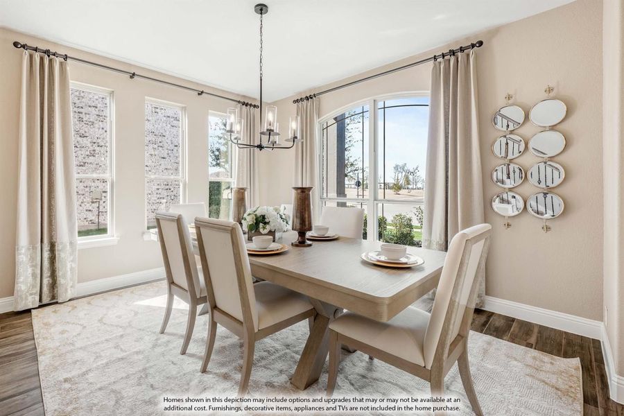 Dining room with wood table, six chairs, chandelier, and large windows with neutral curtains Dining room with wood table, six chairs, chandelier, and large windows with neutral curtains