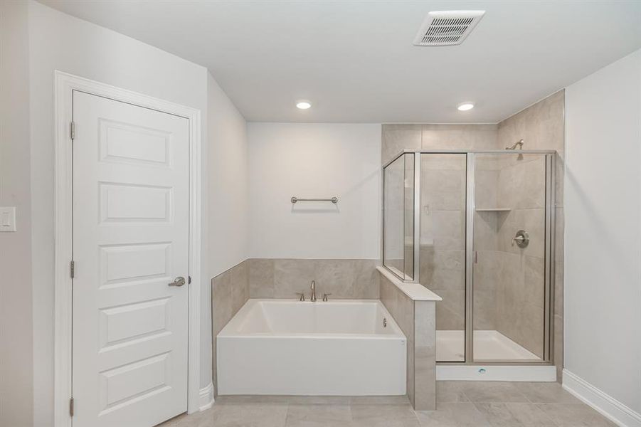 Primary Large Garden tub w Large 42"x36" Shower w Tile up to the top