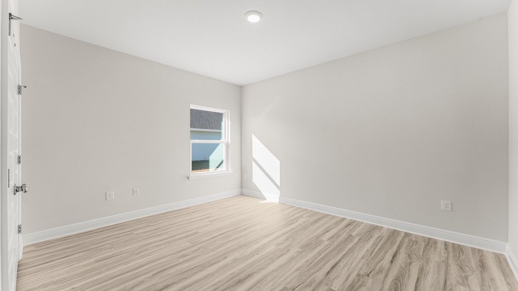 Representative unfurnished interior of a home built from the The Destin by D.R. Horton in Pine Creek and Heron Walk, Port St. Joe (Image 17).