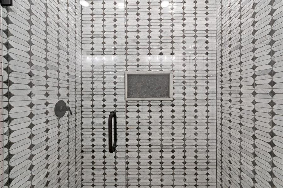 Room details with an enclosed shower