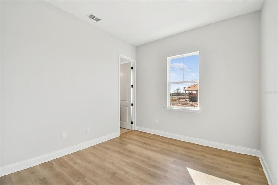 Spacious, unfurnished interior of a new home in Laureate Park at Lake Nona - Park Series, Orlando (Image 17).