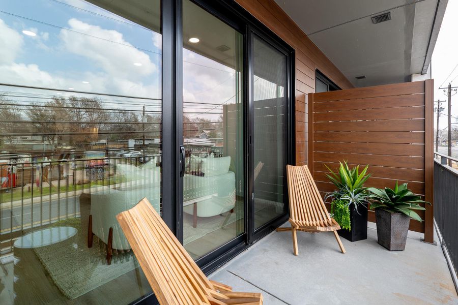 Exterior details and patio area of a home in One Oak, Austin (Image 15). Exterior details and patio area of a home in One Oak, Austin (Image 15).