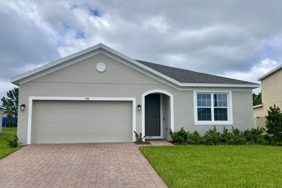 Front exterior of a new home in Park View at the Hills, Minneola, FL, highlighting curb appeal (Image 1). Front exterior of a new home in Park View at the Hills, Minneola, FL, highlighting curb appeal (Image 1).