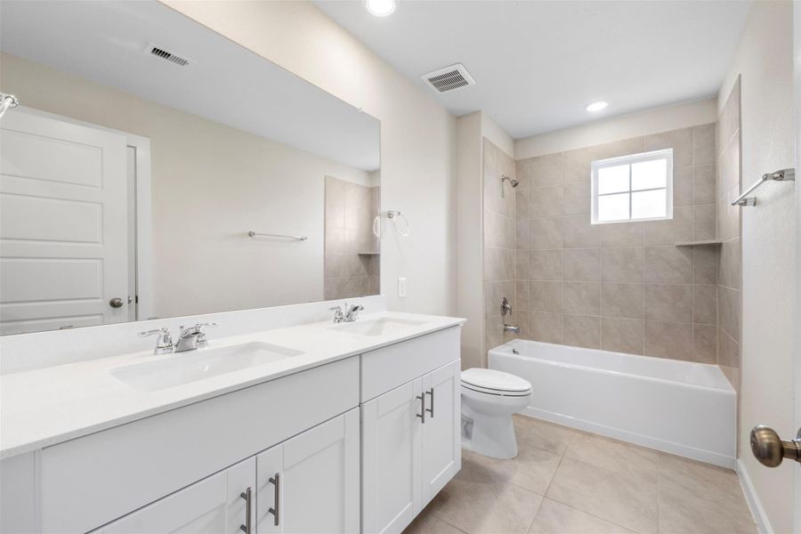 Secondary bathroom located upstairs