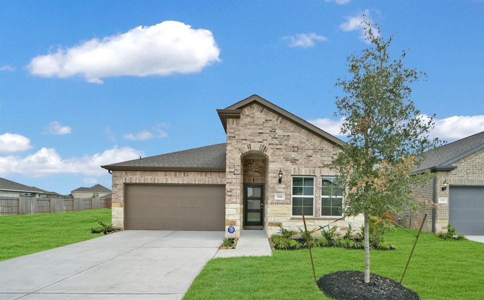 Front exterior of a new home in Sunterra, Katy, TX, highlighting curb appeal (Image 138). Front exterior of a new home in Sunterra, Katy, TX, highlighting curb appeal (Image 138).