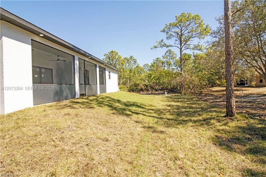 Exterior details and patio area of a home in , Lehigh Acres (Image 30).