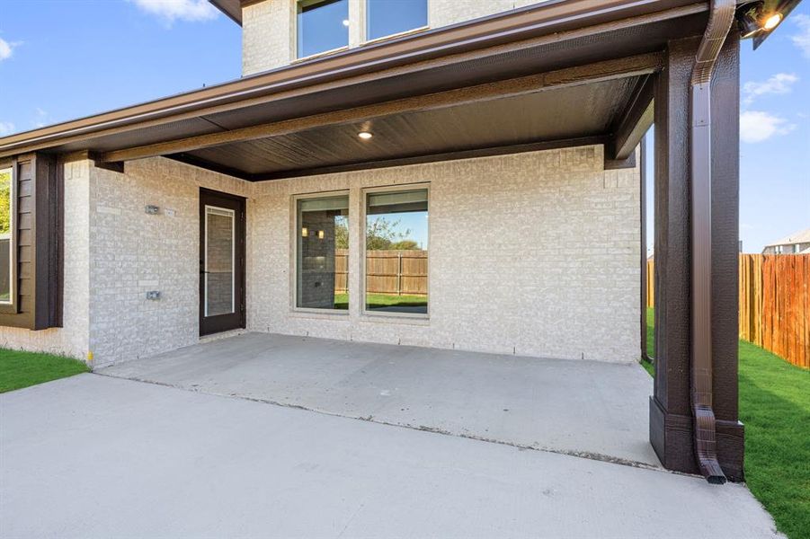 Exterior details and patio area of a home in Villages of Walnut Grove, Midlothian (Image 20).