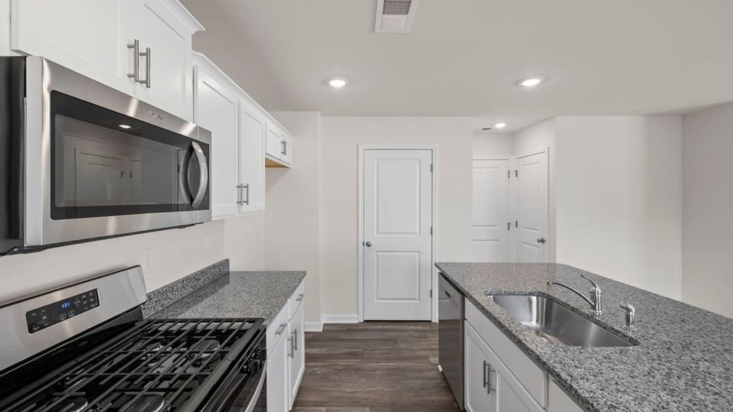 Furnished interior view inside a new home in Bentley Park, Greenwood (Image 9).