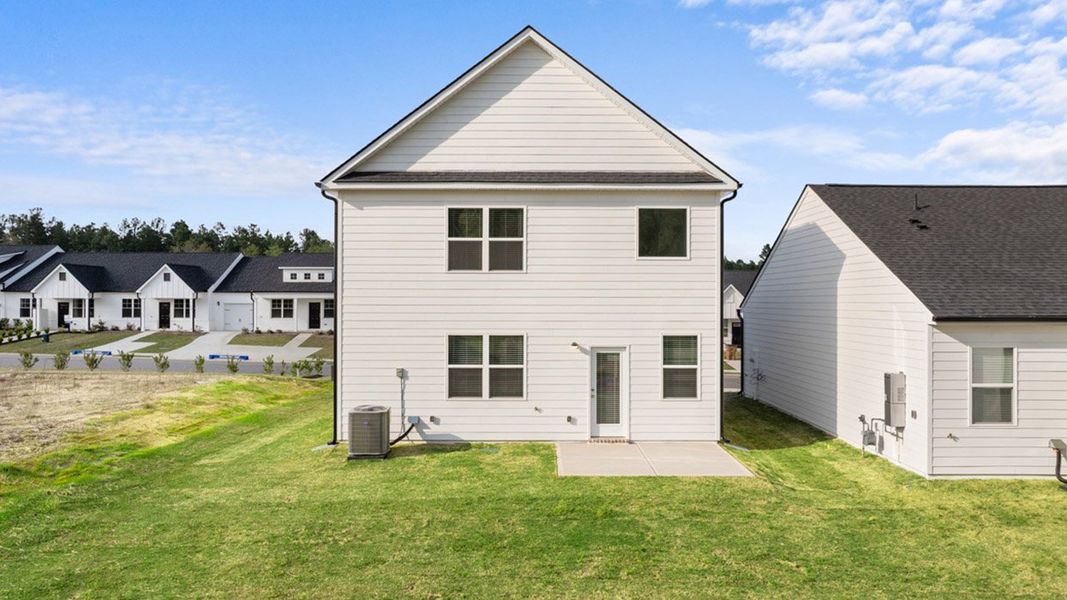 Exterior details and patio area of a home in The Islands, Beech Island (Image 24).