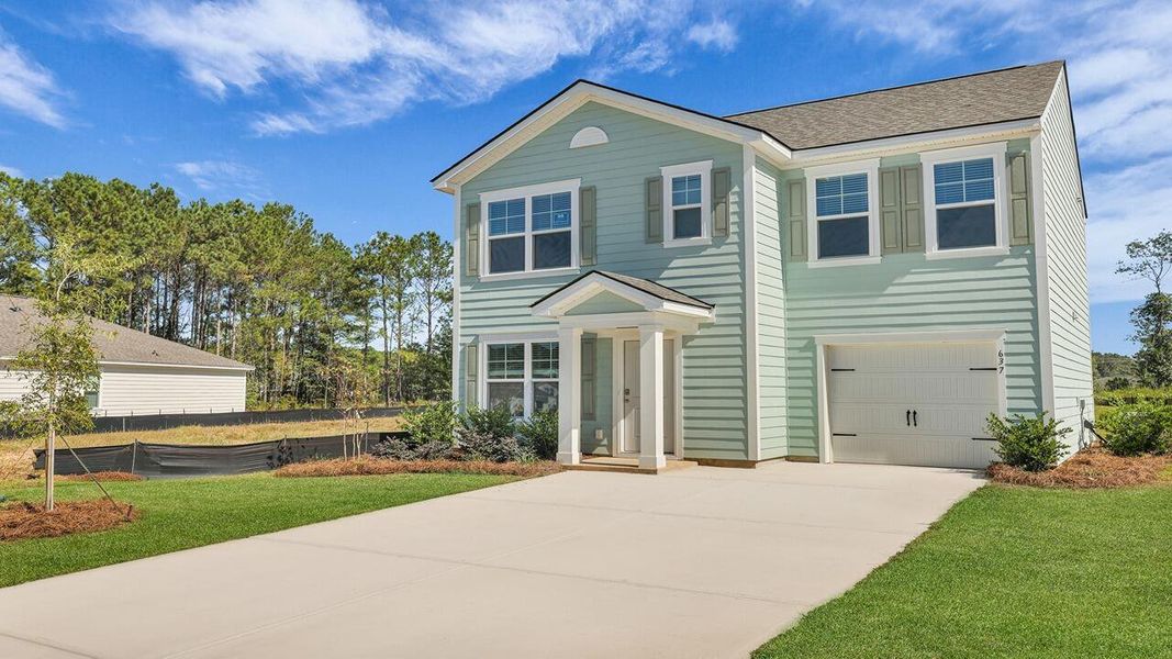 Front exterior of a new home in Center Pointe, Santee, SC, highlighting curb appeal (Image 21).